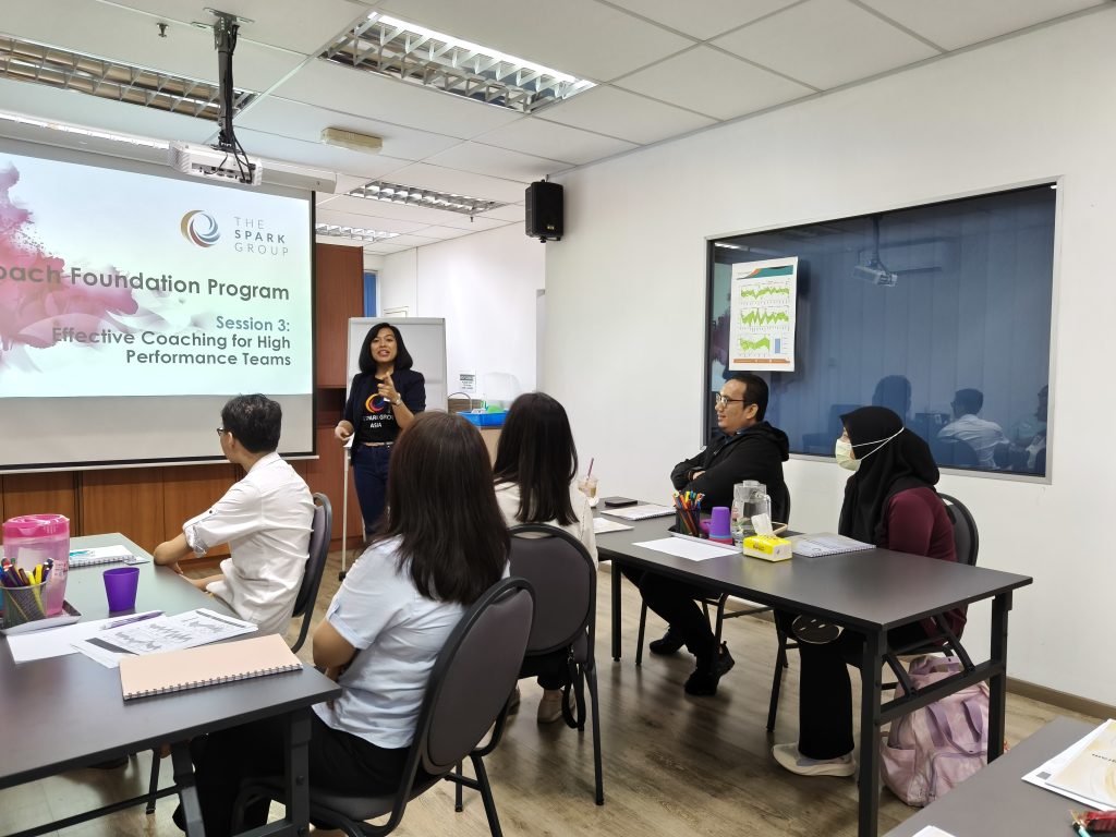 Coach are explaining to the participants on the content from Coach Foundation Program at The Spark Group Asia